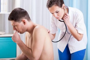 Coughing man having examination